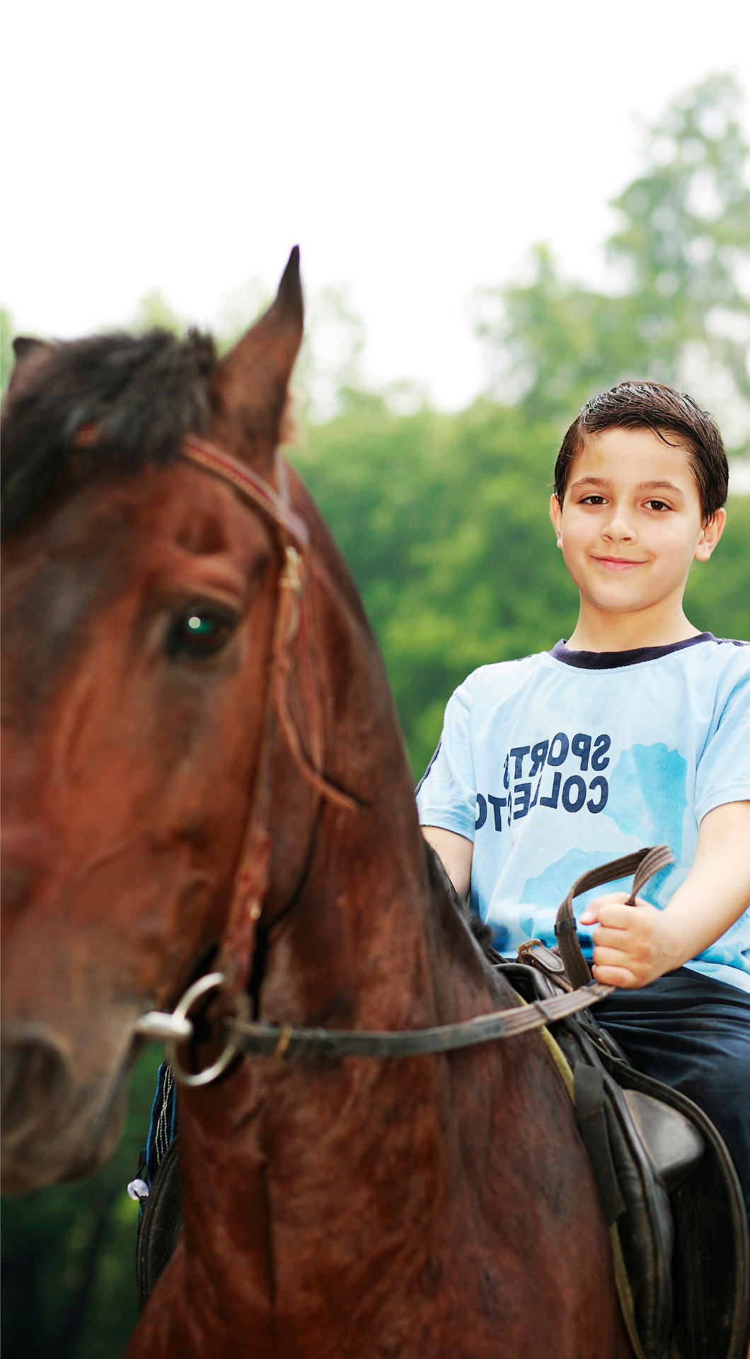 bimbo a cavallo